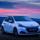 silver honda sedan on brown sand during sunset